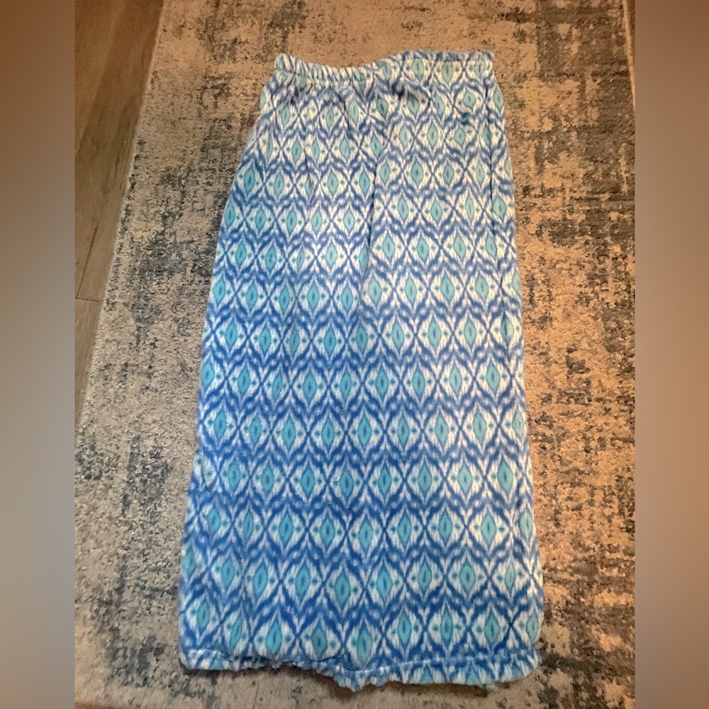 Blue fuzzy towel wrap.